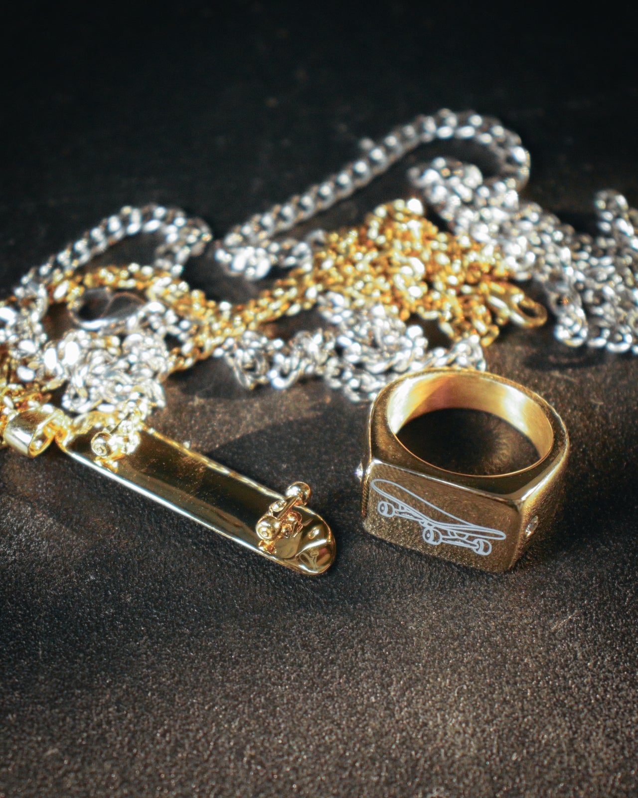 Colgante de patineta (oro)