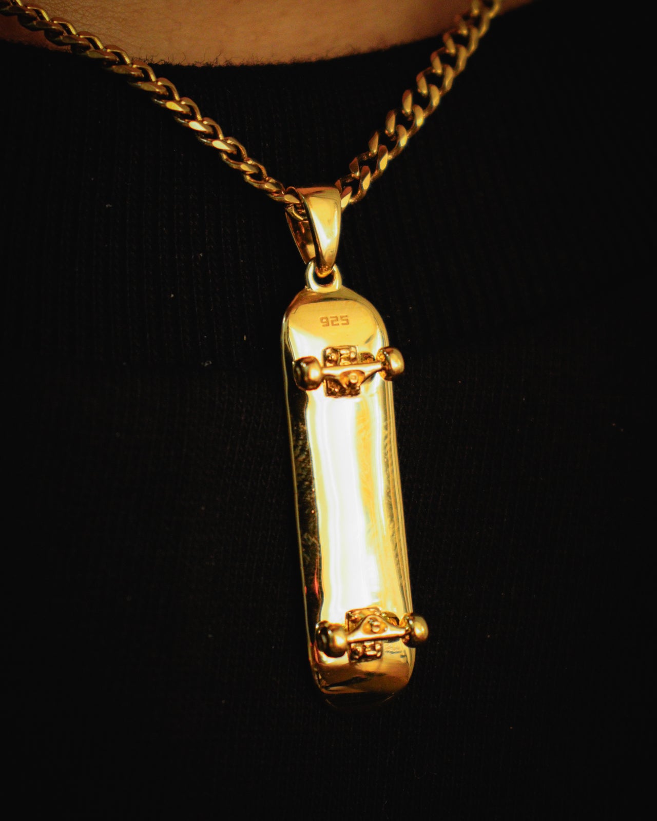 Colgante de patineta (oro)