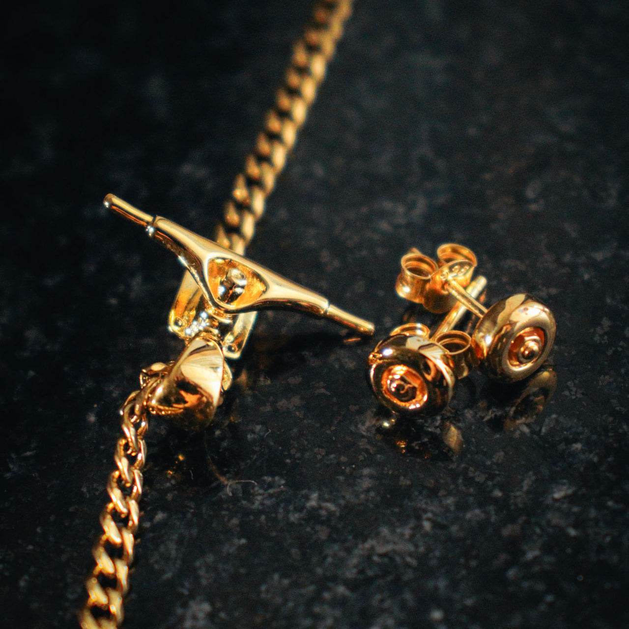 Colgante de patineta (oro)